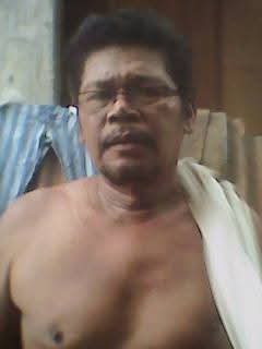 Portrait: Aquilino "Kelly" Yamut (Patriarch of the Galeon‑Yamut Family)